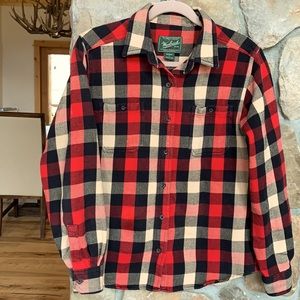 Women’s Woolrich button down plaid shirt.